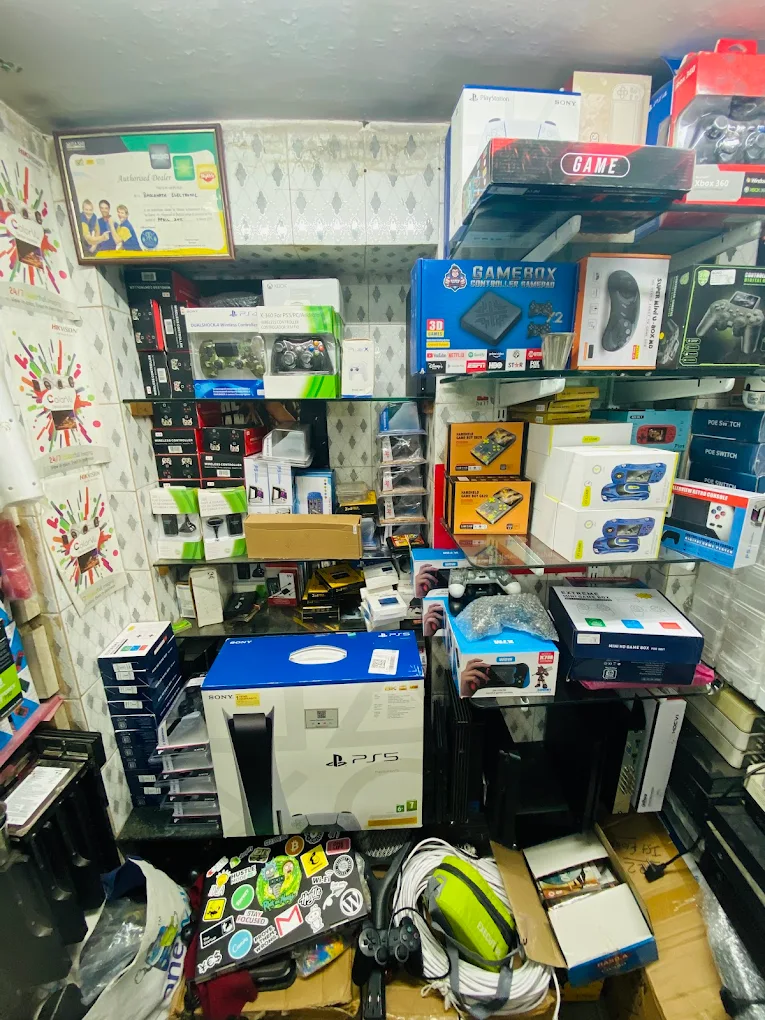 Console repair workbench at BH Video Game Store, Ahmedabad